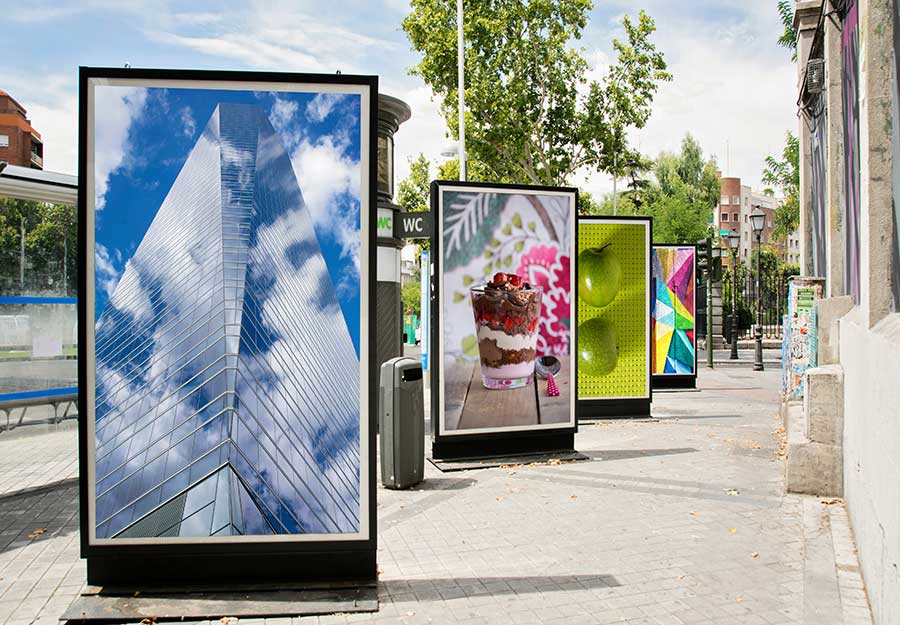 Posters lining sidewalk